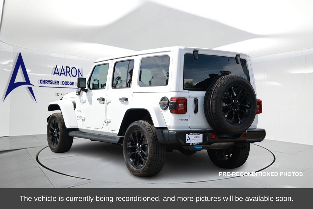 Used 2023 Jeep Wrangler 4xe Sahara 4XE with VIN 1C4JJXP60PW556580 for sale in Norco, CA