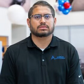 Staff member Pedro Cortes from ID_6f6ba9e724cc