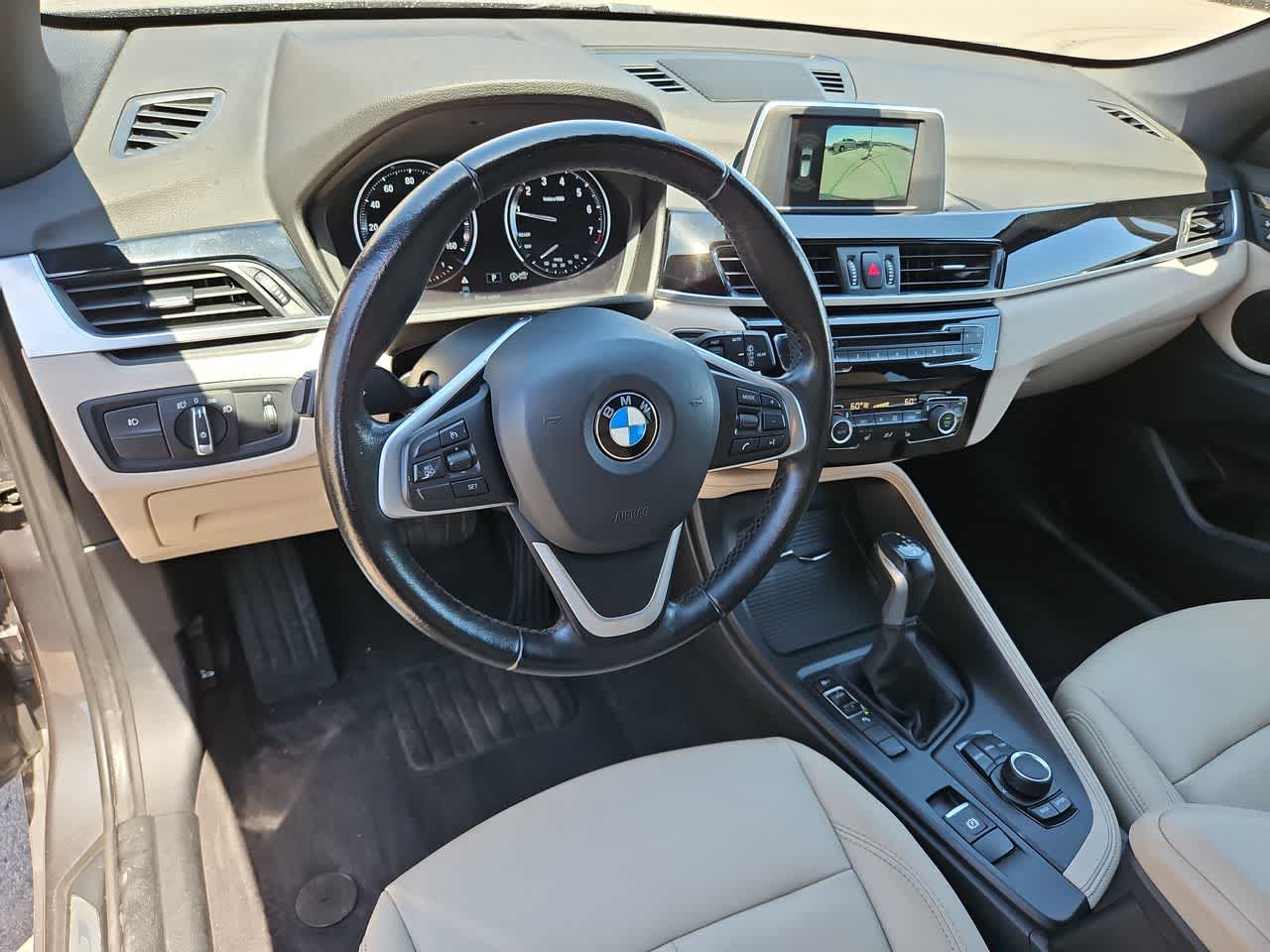 Used 2018 BMW X1 28i with VIN WBXHU7C35J5L09606 for sale in Las Vegas, NV