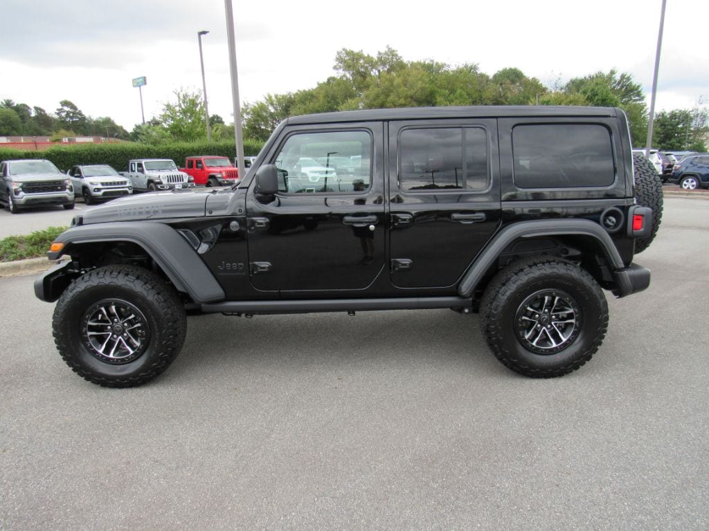New 2025 Jeep Wrangler 4-DOOR WILLYS Sport Utility