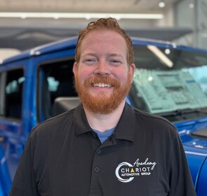 Staff member CHRISTOPHER LOGAN from ID_5d7c703e1074