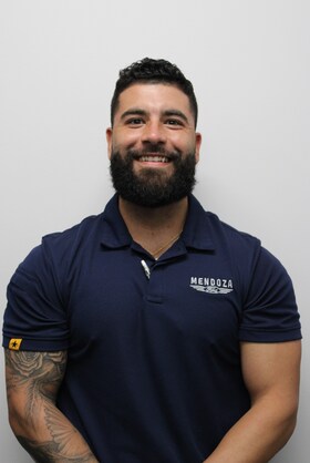 Staff member Nathan Mendoza from 6038f5bac25f