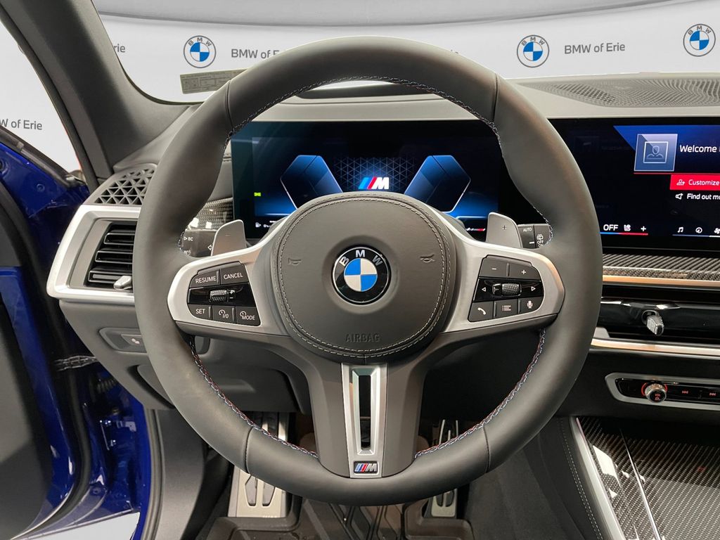 2026 BMW X5 M60i Marina Bay Blue Metallic at New Motors
