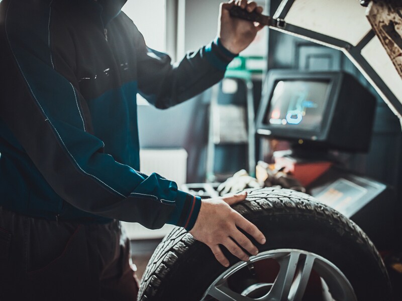 Technician changing tires