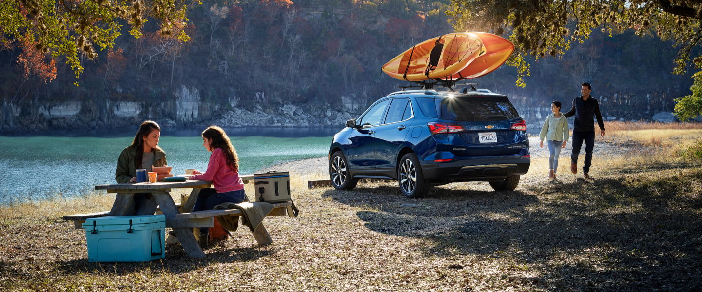 Blue 2022 Chevrolet Equinox near a lake