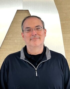 Staff member Mike Cole from ID_0405d2e3a1c2