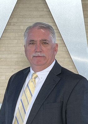 Staff member Donald Petermann from ID_d32ef406a977