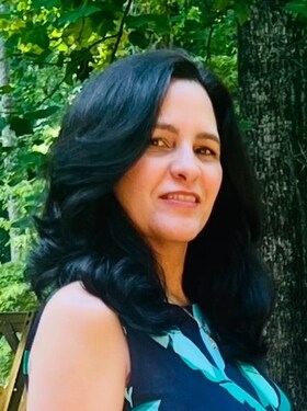 Staff member Ayme Del Valle from ID_4f3bff6a7b78