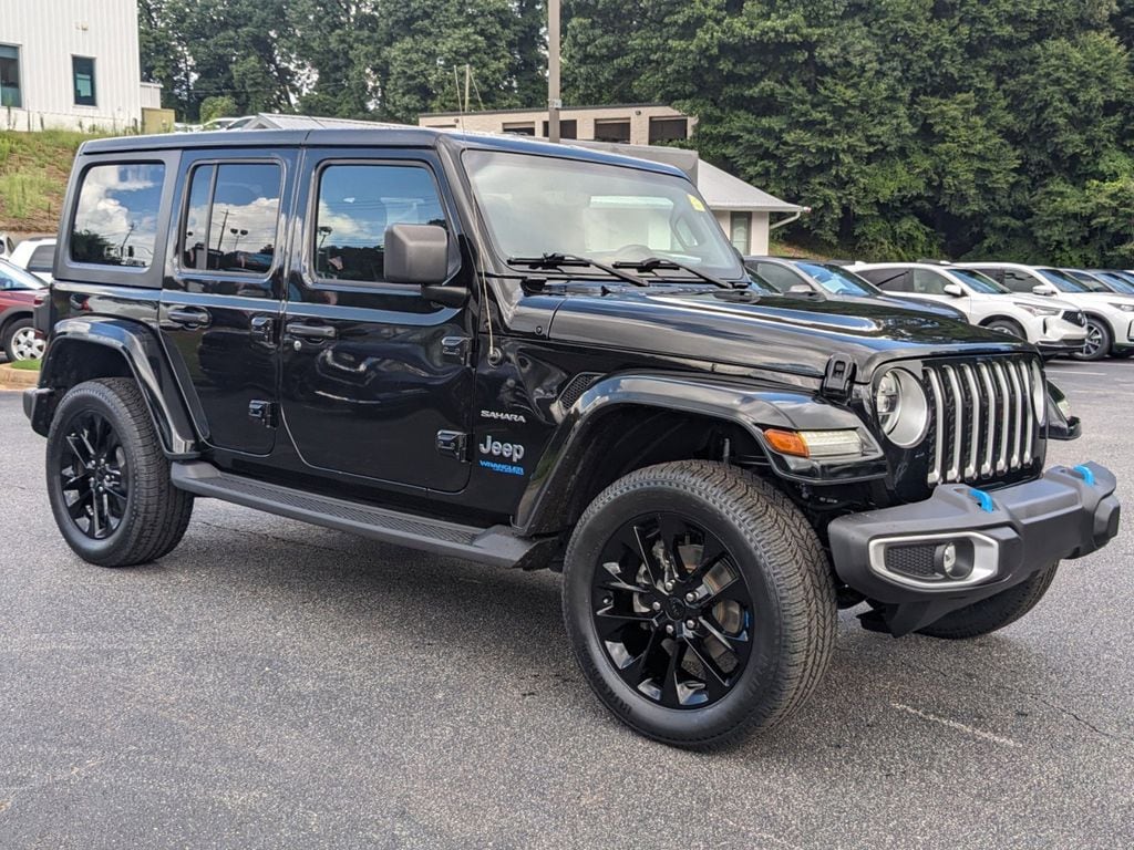 Used 2022 Jeep Wrangler Unlimited Sahara 4XE with VIN 1C4JJXP68NW136854 for sale in Athens, GA