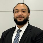 Staff member Derick Pinto from 58f40543601b