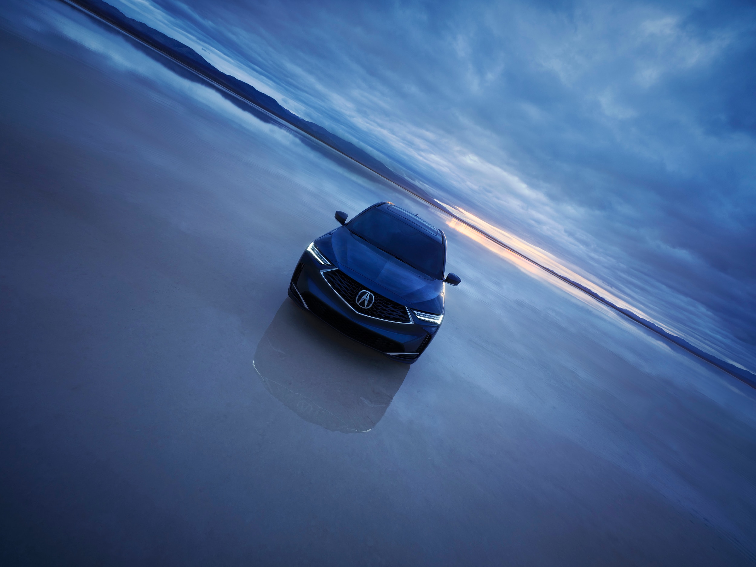  2025 MDX driving on a highway