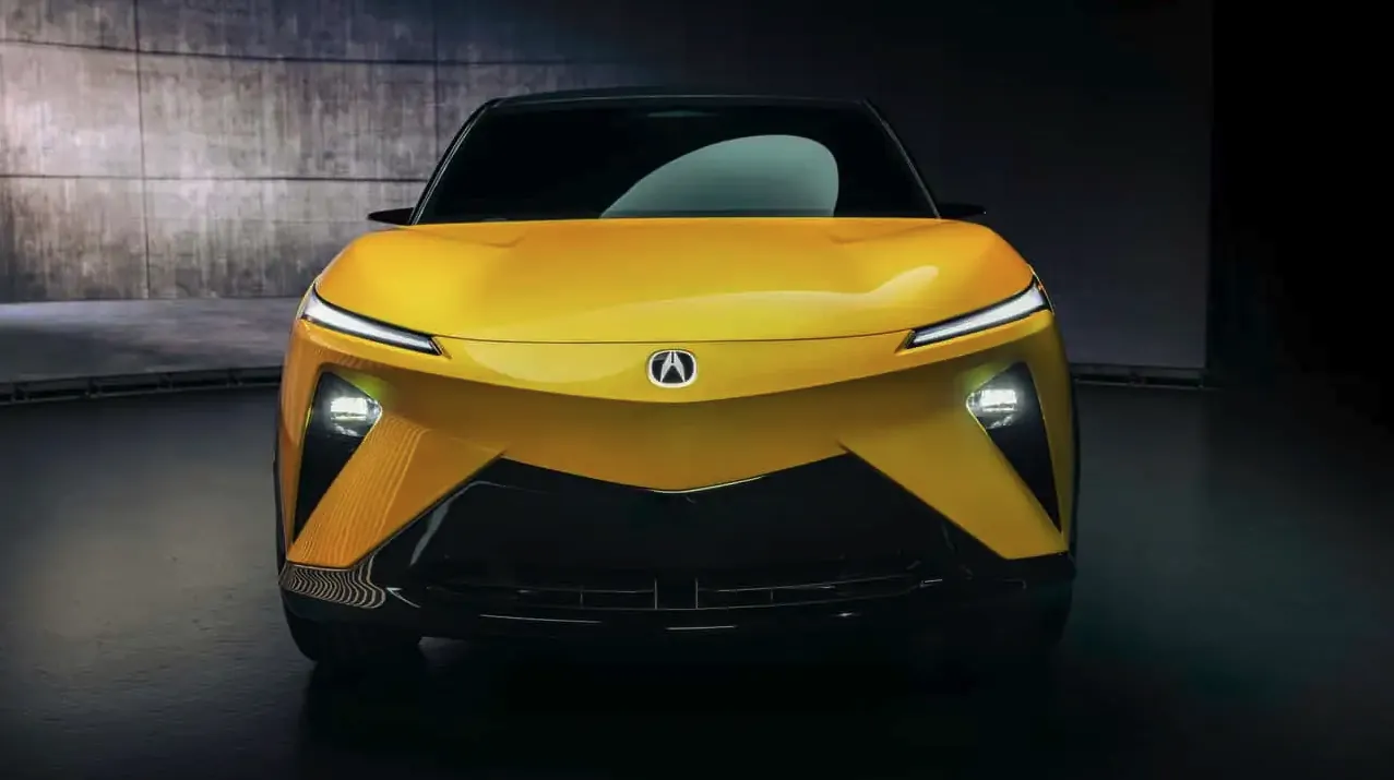 Rear three-quarter profile of the yellow Acura RSX EV prototype