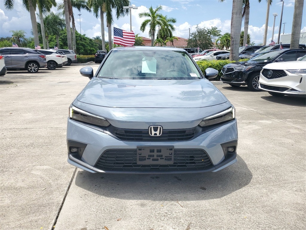 Used 2023 Honda Civic Touring with VIN 2HGFE1F93PH311842 for sale in Pembroke Pines, FL