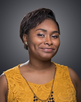 Staff member Lyndie Dareus from 588769f64d1c