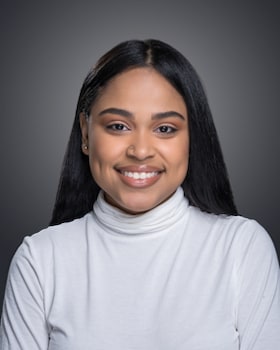 Staff member Suelis Almonte from 588769f64d1c