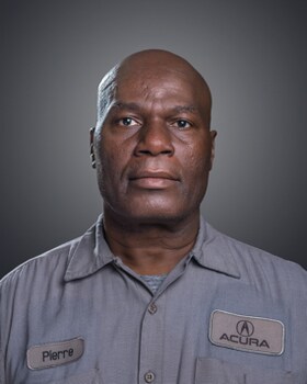 Staff member Pierre Normil from 23787dda09b3