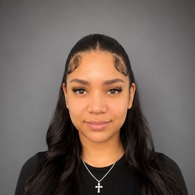 Staff member Lauren Palomita Reyes from 588769f64d1c