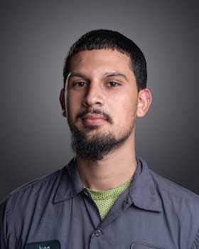 Staff member Juan Ojoini from 5fde1feca96b