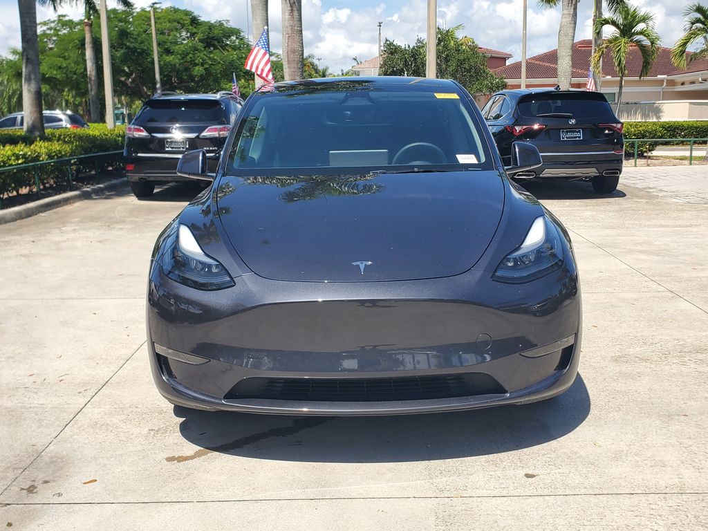Used 2025 Tesla Model Y Long Range with VIN 7SAYGDEE6SA359805 for sale in Pembroke Pines, FL