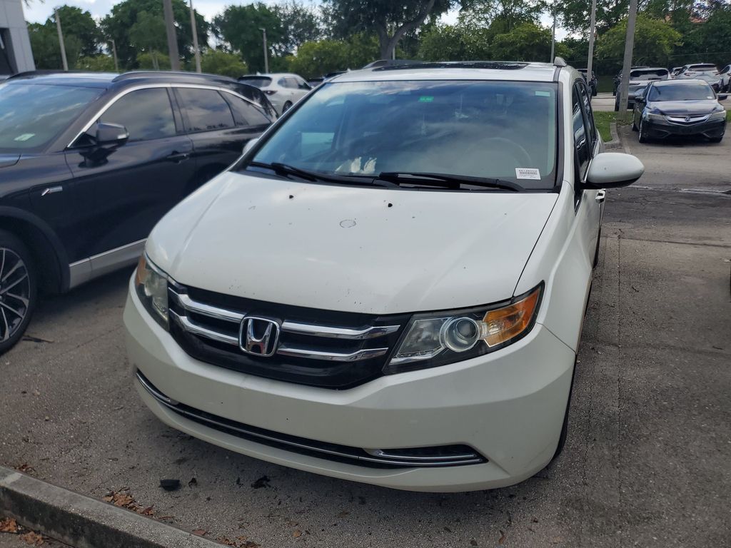 Used 2014 Honda Odyssey EX-L with VIN 5FNRL5H67EB025135 for sale in Pembroke Pines, FL