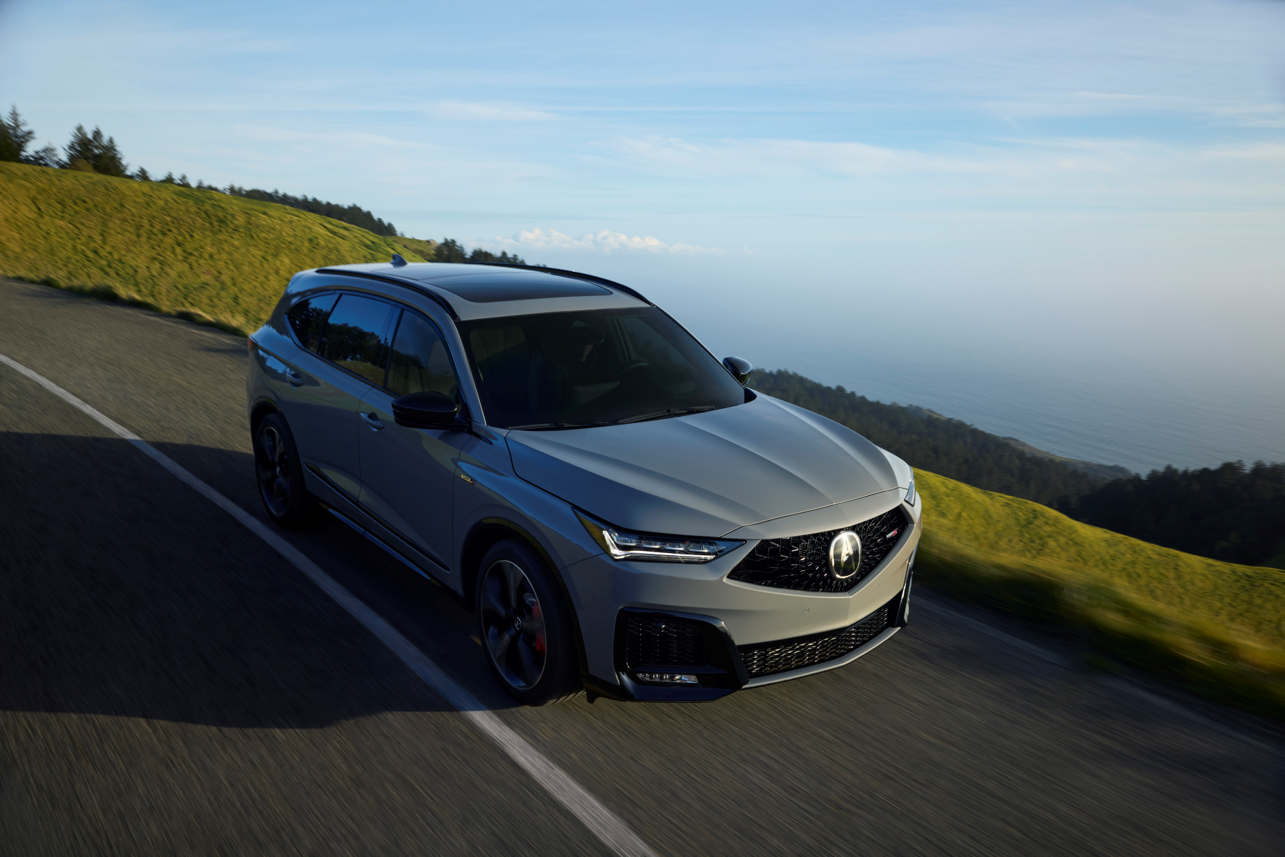 2026 Acura MDX driving the coast