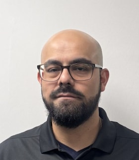 Staff member Gilberto Vargas from ID_29e123