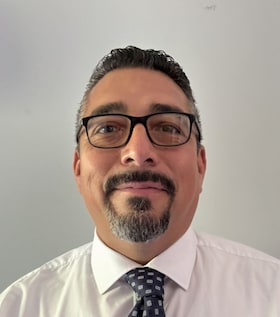 Staff member Esteban Garza from ID_66f7d3