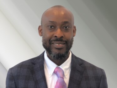 Staff member Cyril Oghomeh from ID_44ebea