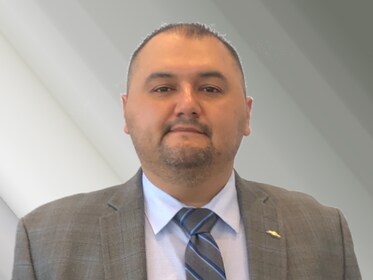 Staff member Robert Alanis from ID_b70716