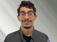 Staff member Chris De La Rosa from ID_a18646