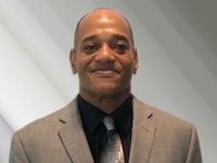 Staff member Victor Riley from ID_3d9cba