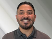 Staff member Hamde Nassar from ID_3d9cba