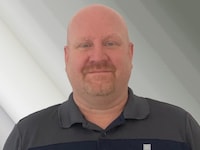 Staff member Douglass Hoffman from ID_817586