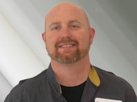 Staff member Mark Diamantos from ID_6c26ee