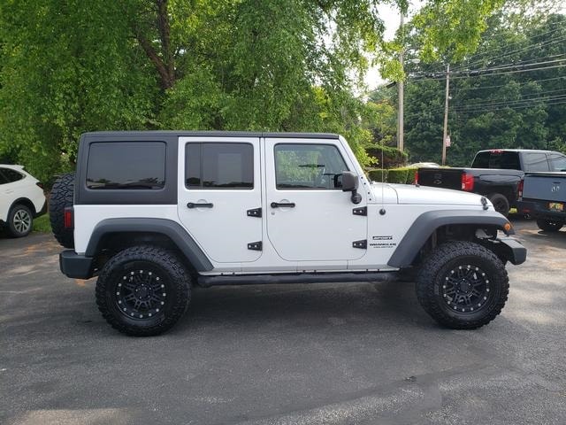 Used 2013 Jeep Wrangler Unlimited Sport with VIN 1C4BJWDG1DL701442 for sale in Painesville, OH