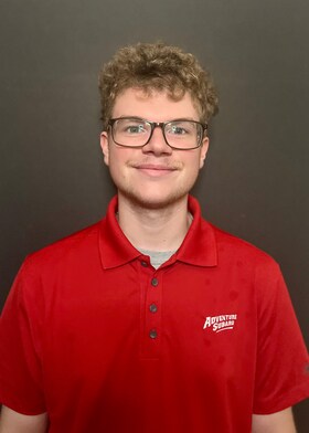 Staff member Jonah Collins from ID_8af3c66eb672