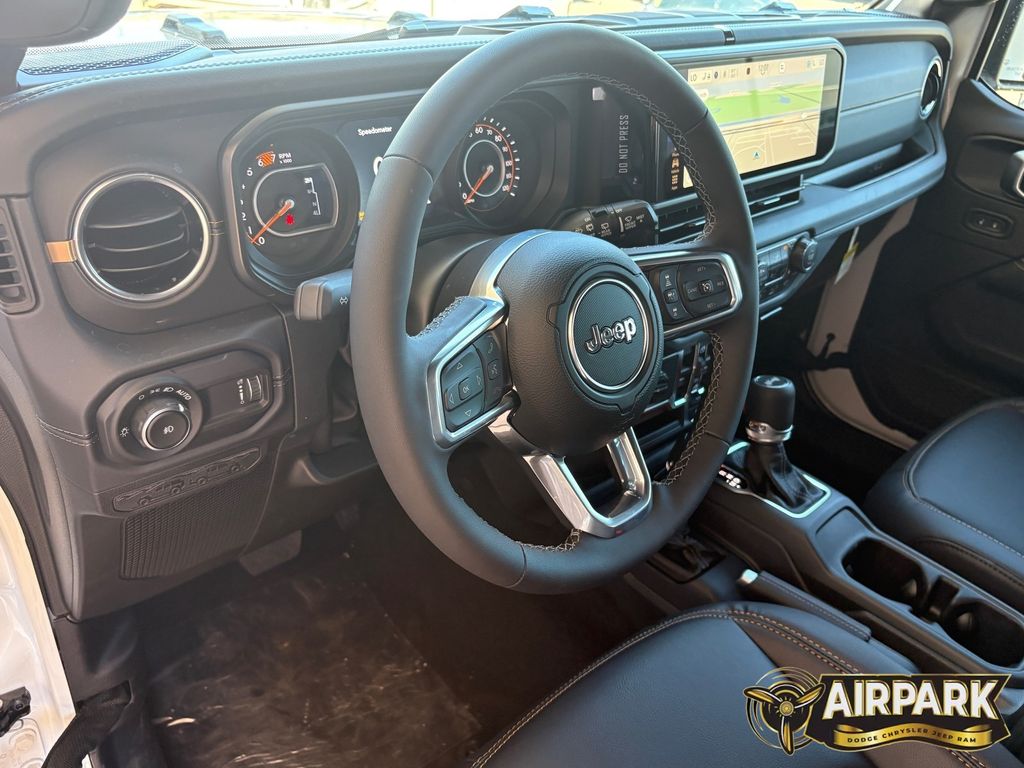 New 2026 Bright White Jeep Sahara image 14