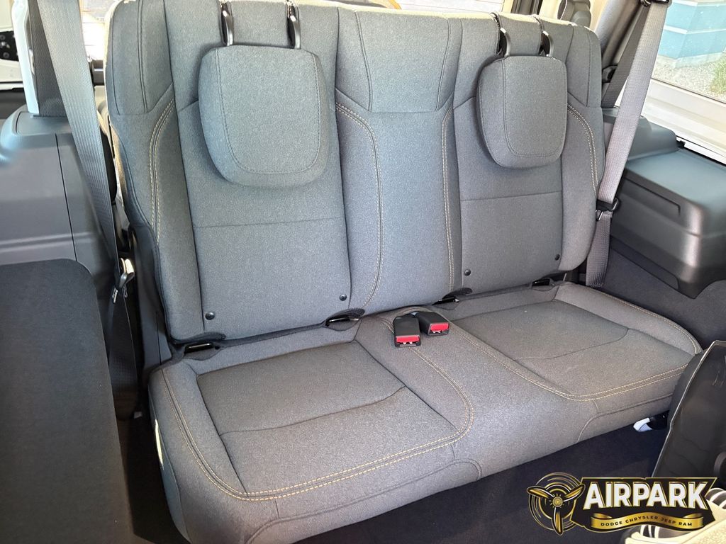 New 2026 Bright White Jeep Sport image 12