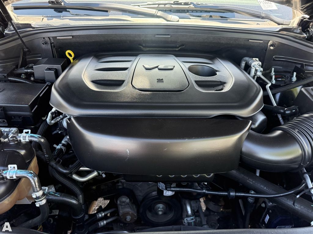 Used 2021 Diamond Black Crystal Pearlcoat Jeep Laredo E image 28