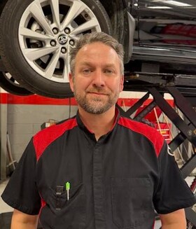 Staff member Brandon Webster from ID_243965