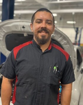 Staff member Andrew Wilson from ID_243965