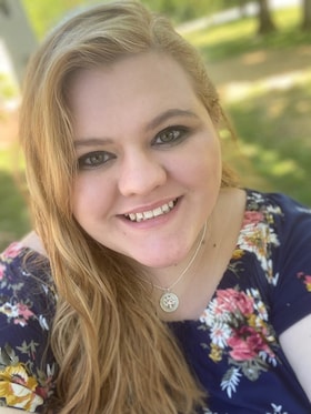 Staff member Halee Dennis from ID_243965