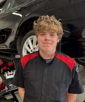 Staff member Grayson Anderson from ID_243965