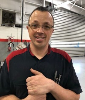 Staff member Eric Roach from ID_243965