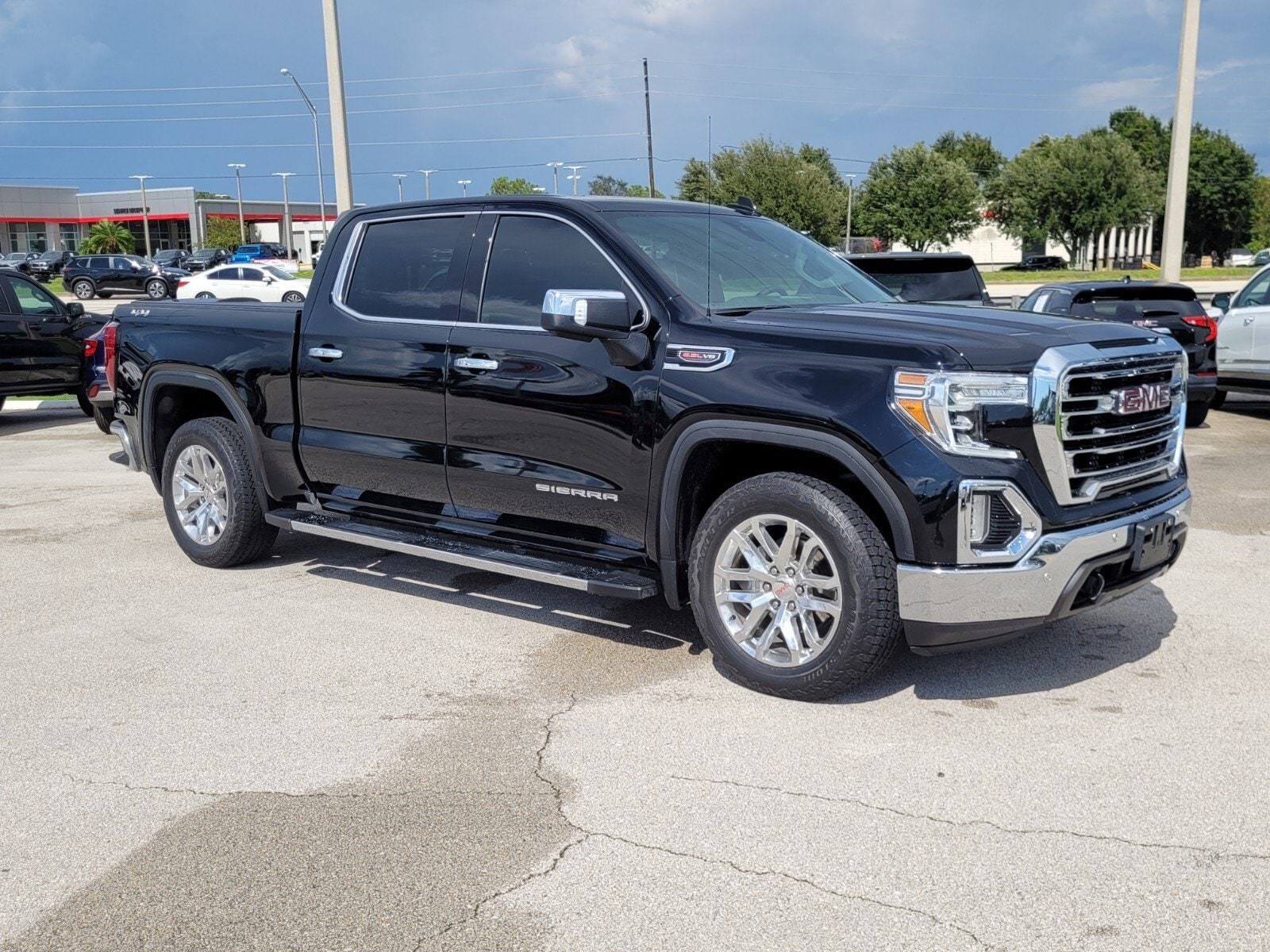 Used 2021 GMC Sierra 1500 SLT with VIN 3GTU9DEL4MG126266 for sale in Sebring, FL