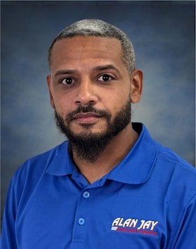 Staff member Luis Guzman from ID_1164dcae5d80