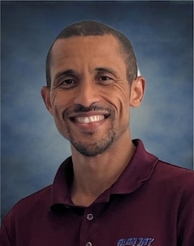 Staff member Leland S. from ID_1a677a94f0a1