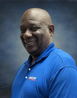 Staff member Lloyd B. from ID_1a677a94f0a1