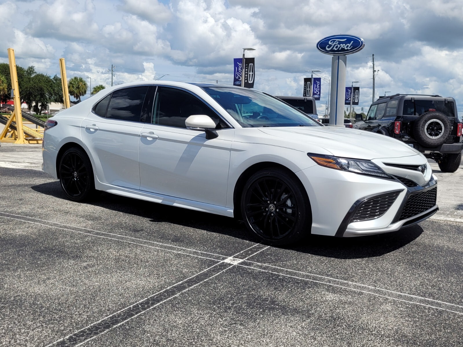 Used 2022 Toyota Camry XSE with VIN 4T1K61BK0NU054891 for sale in Sebring, FL