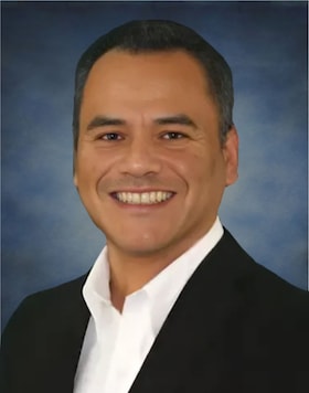 Staff member Santiago Hernandez from ID_52b961218ee4